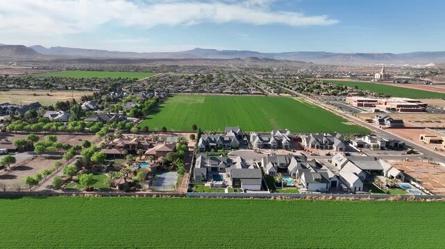 Aerial View of Luxury Homes and Green Fields in Expanding St. George Suburbs