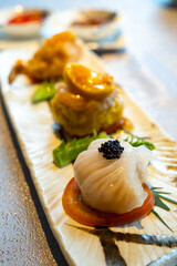 Delicious Dim Sum Platter with Caviar Garnish