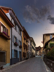 Sunset on the medieval streets in the center of Thusis in Switzerland