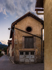 Sunset on the medieval streets in the center of Thusis in Switzerland