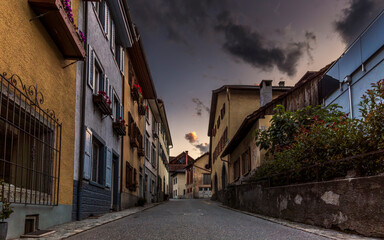 Sunset on the medieval streets in the center of Thusis in Switzerland