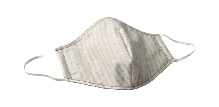 A textured light colored fabric face mask with white ear loops isolated on transparent background