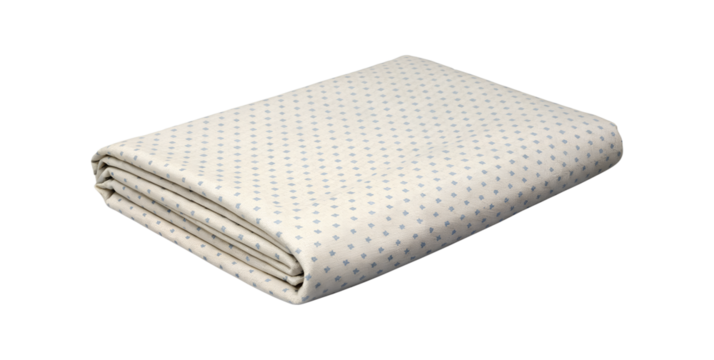 A folded light colored textured blanket or throw with a subtle geometric pattern isolated on transparent background