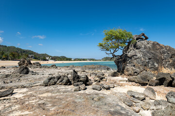 Lombok, Indonesia, Beach ocean landscape with unidentifiable people for surfing at Selong beach...