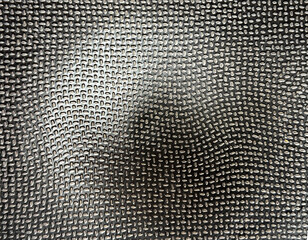 Close up of black metal checkerplate carved in 3D parametric curves. 3D optical illusion on a metal surface. Unique concept. Seamless background texture.