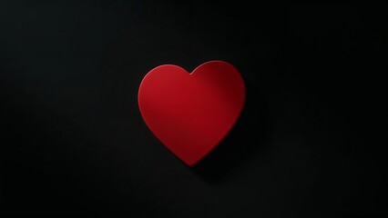 Vibrant red heart symbol prominently displayed on a sleek, minimalist black background, representing love, passion, and care.