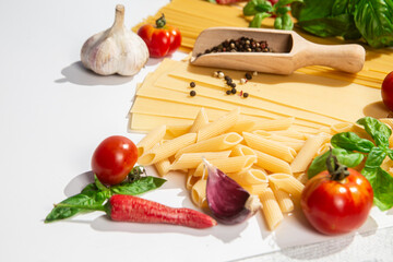 Italian Food Ingredients Pasta, Tomatoes, Basil, Garlic, and Spices