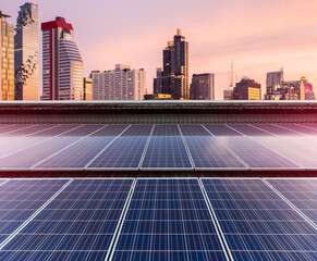 Solar Panel Photovoltaic installation on a Roof of factory, sunny blue sky background, alternative electricity source - Sustainable Resources Concept. © funfunphoto
