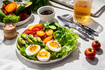 Healthy Salad Bowl with Avocado, Eggs, Tomatoes and Cucumbers, 