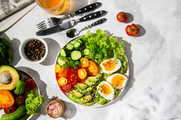 Healthy Salad Bowl with Avocado, Eggs, Tomatoes and Cucumbers, 
