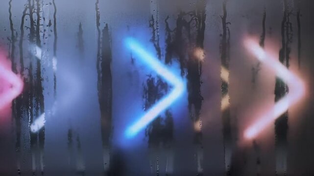 Bright neon arrows flashing through a fogged window. Vibrant glow with moody, misty atmosphere. Perfect for futuristic, cyberpunk, or urban-themed visuals. Seamless loop optional.
