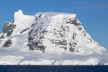 Snow covered mountains of Antarctica © Allen Penton