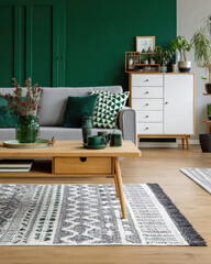 Contemporary Living Room Featuring Green Accent Wall and Stylish Furniture Arrangement
