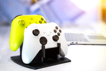 Next Generation video game console controller isolated on white background. © funfunphoto