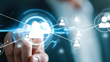 HR Tech: A hand interacts with a futuristic interface of interconnected icons, symbolizing network or human resources, indicating a modern and technological approach to people management.
