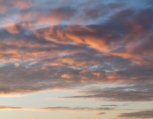 Fototapeta premium Dramatic sunset sky with fiery orange and purple clouds