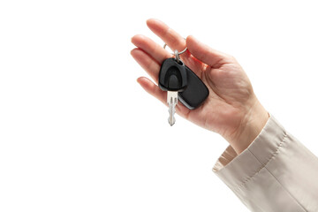 Hand holding car keys on isolated background. Concept of selling or renting a car