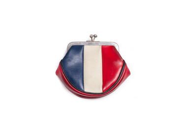 A red, blue and white coin purse on a white background