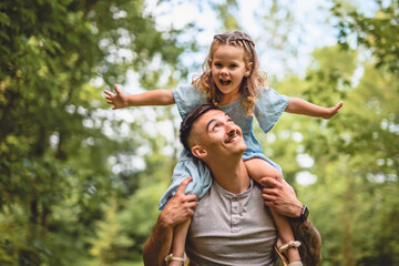 father having great time with his daughter
