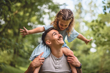 father having great time with his daughter