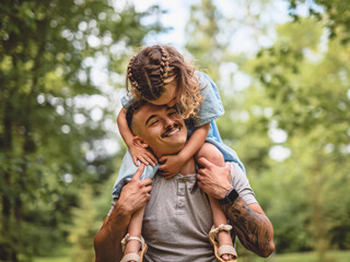 father having great time with his daughter