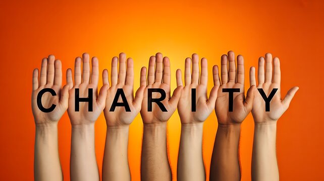 Multiple raised hands with charity text on orange background symbolizing support and donation
