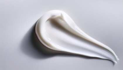 close up smooth white cream or lotion swatch on a minimal white background creamy texture skincare beauty product facial moisturizer