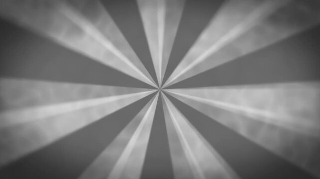 retro circus background animation of spinning  sun rays spiral wheel in grayscale
