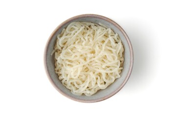 Shirataki noodlei n a bowl isolated on white background. Seen directly above.	