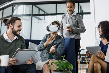 Group of young latin business people using virtual reality glasses during meeting testing VR headset at office in Mexico Latin America. hispanic people at working at job