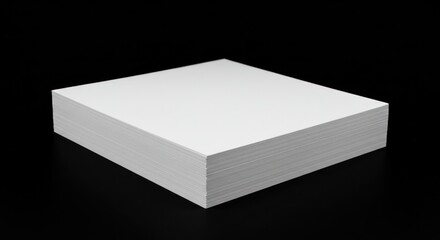 Stark Contrast: A Precisely Stacked Pile of Blank White Paper Against a Deep Black Background