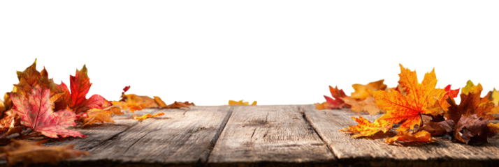 Autumn leaves on a rustic wooden surface (1)