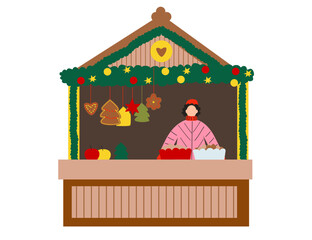 Christmas market booth with decorated wooden stall, woman seller, hanging cookies, apples, and festive garland