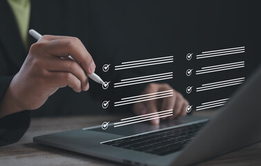 Executive completing virtual checklist use stylus on laptop interface, representing task management, digital organization, productivity tracking, and efficient workflow in modern business environment.