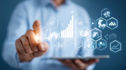 Businessman using tablet with digital interface, showcasing technology, data analysis, and modern business solutions in a bright office environment.