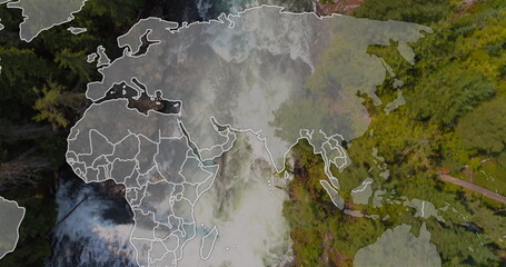 Flowing waterfall cutting through woodland at mountain path, with orange kayak, world map overlay