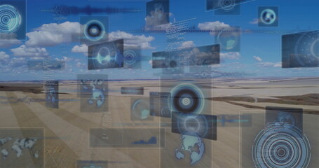 Displaying translucent HUD panels over plowed fields under blue sky with charts and map icons