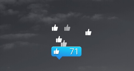 Floating white thumbs-up icons over dark cloudy sky, with blue notification bubble showing 71 likes