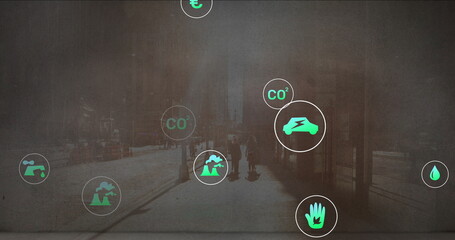Walking two adults leading small dog on sunlit downtown sidewalk with green CO? and eco icons