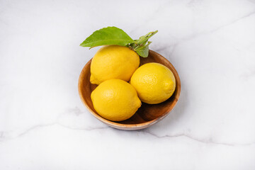 Citrons dans bol en bois