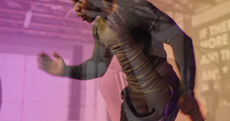 Sprinting male athlete wearing performance gear in gym, with faint female runner overlay