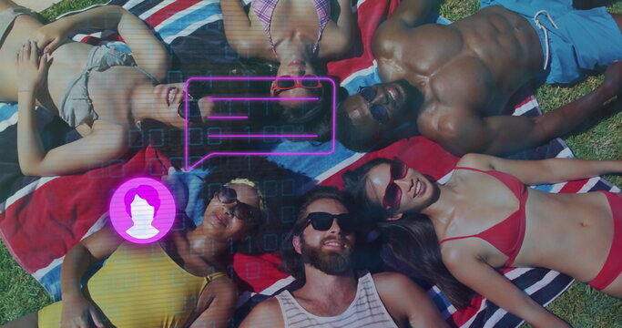 Lying friends in swimsuits and sunglasses forming ring on lawn with striped towels, graphic overlay