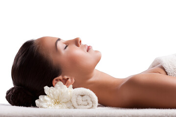 Peaceful woman enjoying spa treatment with flower for beauty and wellness promotion relaxation