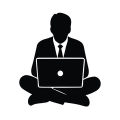 Silhouette of a businessman working on a laptop in a lotus position