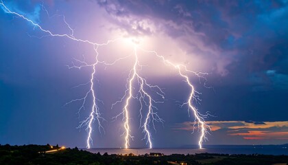 Dramatic lightning strikes over a tranquil lake at twilight