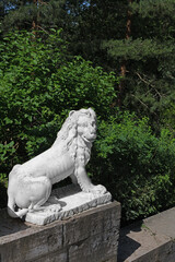 Funny smiling lion on Big Stone Staircase in famous Pavlovsk park, Saint Petersburg, Russia