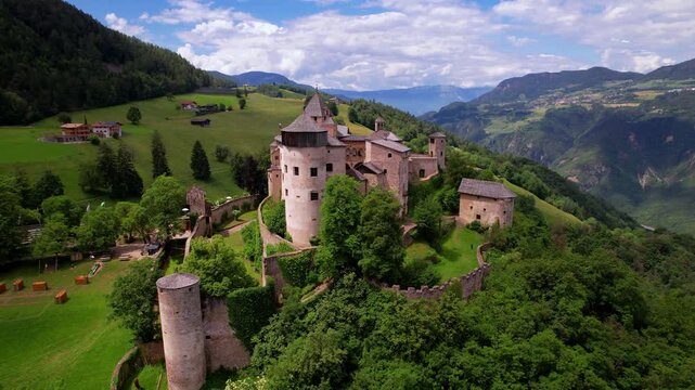 Cinematic Aerial Drone View of Medieval Presule Castle South Tyrol Italy Majestic Alpine Architecture High Altitude Landscape Historic Fortress Among Dolomite Mountains Slow Living Travel Footage 4K