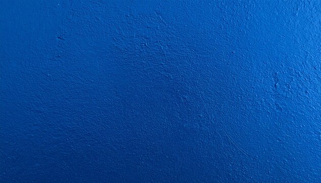 Textured blue concrete wall with subtle scratches and uneven surface variations, evoking raw industrial character and cool-toned minimalism.