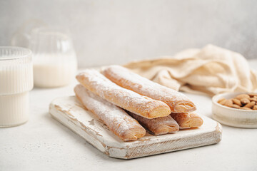 Fartons, typical sponge pastries of Valencia, Spain, made to be dipped in horchata or hot beverages like chocolate or coffee