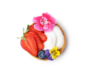 One sweet tartlet with berries and flowers isolated on white, top view. Delicious dessert